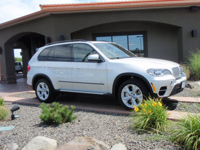 bmw x5 2012 silver xdrive50i gasoline 8 cylinders all whee drive automatic 99352