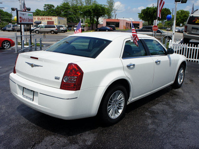 chrysler 300 2010 white sedan touring gasoline 6 cylinders rear wheel drive automatic 33021