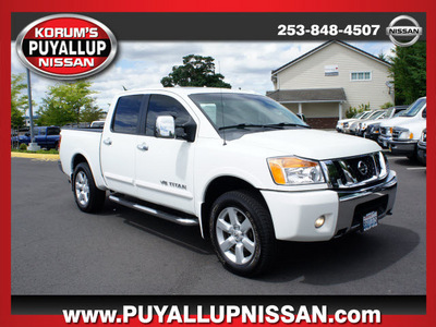 nissan titan 2009 white le 4x4 gasoline 8 cylinders 4 wheel drive automatic 98371