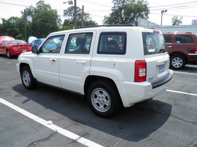 jeep patriot 2010 white suv sport gasoline 4 cylinders 2 wheel drive automatic 32447