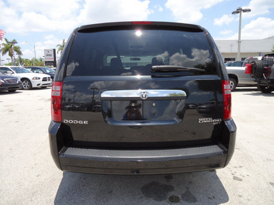 dodge grand caravan 2010 black van sxt gasoline 6 cylinders front wheel drive automatic 33157