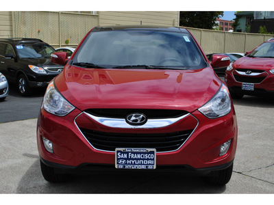 hyundai tucson 2011 dk  red limited gasoline 4 cylinders all whee drive automatic 94010