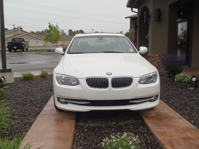 bmw 3 series 2011 white coupe 335i gasoline 6 cylinders rear wheel drive 6 speed manual 99352