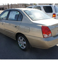 hyundai elantra 2005 gold sedan gasoline 4 cylinders front wheel drive not specified 47130