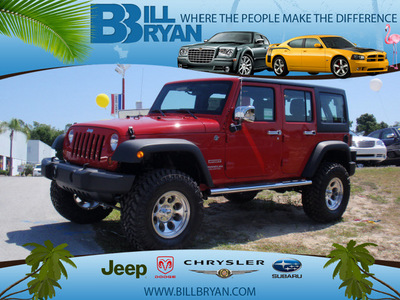jeep wrangler unlimited 2011 red suv sport gasoline 6 cylinders 4 wheel drive automatic 34731