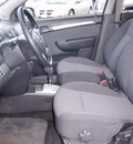 chevrolet aveo 2011 silver sedan lt gasoline 4 cylinders front wheel drive automatic 98632