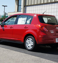 nissan versa 2011 red hatchback 1 8 s gasoline 4 cylinders front wheel drive 4 speed automatic 47130