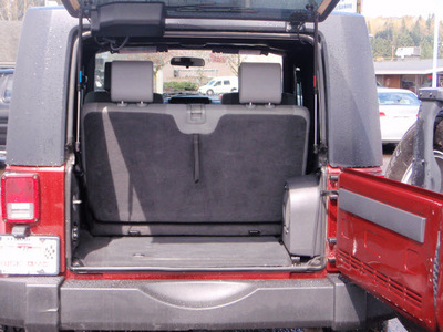 jeep wrangler 2007 red suv sahara gasoline 6 cylinders 4 wheel drive manual 98632