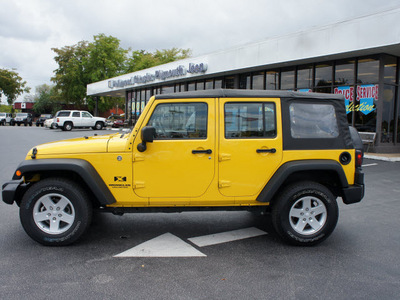jeep wrangler unlimited 2008 yellow suv x gasoline 6 cylinders 4 wheel drive 6 speed manual 33021