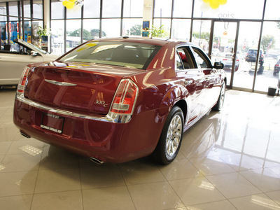 chrysler 300 2011 prp deep cherry red sedan gasoline 8 cylinders rear wheel drive automatic 33021