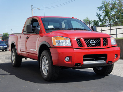 nissan titan 2011 red pro 4x gasoline 8 cylinders 4 wheel drive 5 speed automatic 47130