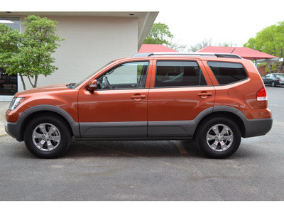 kia borrego 2009 brown suv ex gasoline 6 cylinders 2 wheel drive automatic 76903