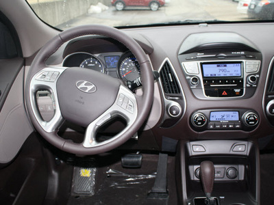 hyundai tucson 2011 blue suv limited gasoline 4 cylinders all whee drive 6 speed automatic 47130