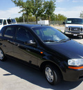chevrolet aveo 2004 black hatchback gasoline 4 cylinders front wheel drive 5 speed manual 76205