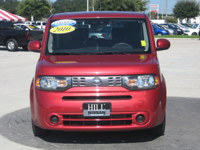 nissan cube 2010 red suv gasoline 4 cylinders front wheel drive automatic 33884