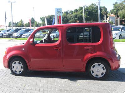 nissan cube 2010 red suv gasoline 4 cylinders front wheel drive automatic 33884