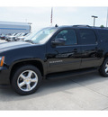 chevrolet suburban 2011 black suv lt flex fuel 8 cylinders 2 wheel drive 6 spd auto,hd,elec cntlls 77090