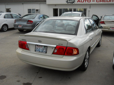 kia optima 2006 beige sedan ex gasoline 6 cylinders front wheel drive shiftable automatic 99212