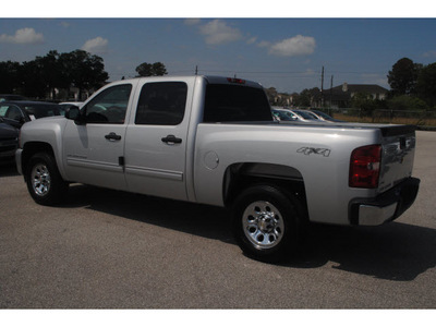 chevrolet silverado 1500 2011 silver ls flex fuel 8 cylinders 4 wheel drive 4 spd auto,elec cntlled 77090