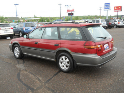 subaru legacy 1997 red wagon outback gasoline 4 cylinders all whee drive 5 speed manual 55811