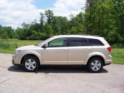 dodge journey 2011 gold suv mainstreet flex fuel 6 cylinders front wheel drive not specified 44024