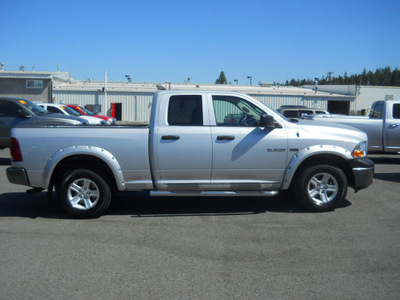 dodge ram pickup 1500 2009 silver st gasoline 8 cylinders 4 wheel drive 5 speed automatic 99212