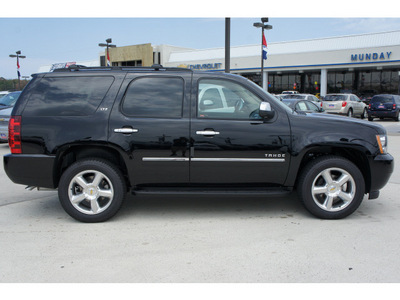 chevrolet tahoe 2011 black suv ltz flex fuel 8 cylinders 2 wheel drive automatic with overdrive 77090