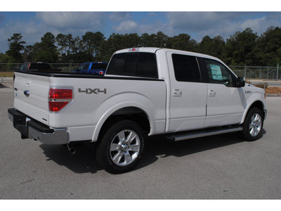 ford f 150 2011 white lariat flex fuel 8 cylinders 4 wheel drive automatic 77388