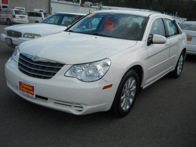 chrysler sebring 2010 white sedan limited gasoline 4 cylinders front wheel drive 4 speed automatic 99212