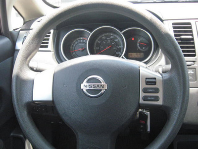 nissan versa 2010 black sedan gasoline 4 cylinders front wheel drive automatic 33884