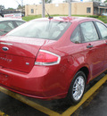 ford focus 2009 red sedan se gasoline 4 cylinders front wheel drive automatic with overdrive 13212