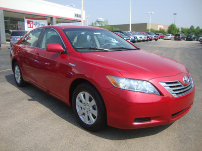 toyota camry hybrid 2009 red sedan camry hybrid 4 cylinders front wheel drive automatic 45342