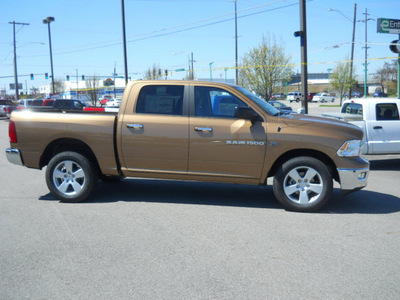 ram ram pickup 1500 2011 saddle brown pearl big horn gasoline 8 cylinders 4 wheel drive 5 speed automatic 99212