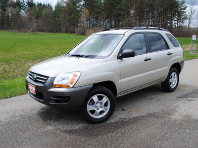 kia sportage 2008 tan suv lx gasoline 4 cylinders front wheel drive not specified 44024