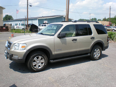 ford explorer 2006 tan suv xlt gasoline 6 cylinders 4 wheel drive automatic with overdrive 13212