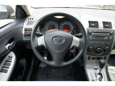 toyota corolla 2010 black sedan s gasoline 4 cylinders front wheel drive not specified 28677