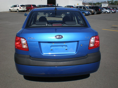 kia rio 2009 blue sedan gasoline 4 cylinders front wheel drive automatic 13502