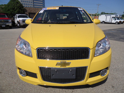 chevrolet aveo 2011 yellow hatchback aveo5 lt gasoline 4 cylinders front wheel drive automatic 60007