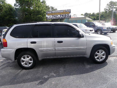 gmc envoy 2004 silver suv gasoline 6 cylinders rear wheel drive automatic 32401