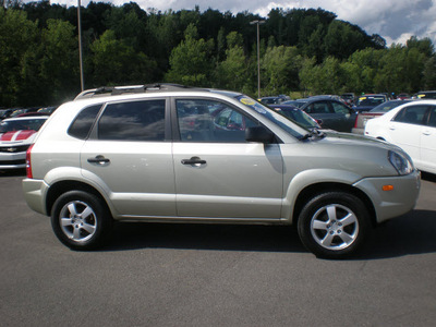 hyundai tucson 2006 gold suv gl gasoline 4 cylinders front wheel drive automatic 13502