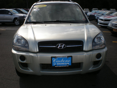 hyundai tucson 2006 gold suv gl gasoline 4 cylinders front wheel drive automatic 13502