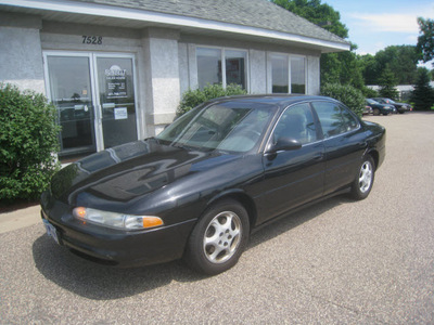 oldsmobile intrigue 1998 black sedan gl gasoline v6 front wheel drive automatic 55016