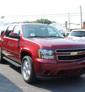 chevrolet suburban 2011 red suv ls 1500 flex fuel 8 cylinders 4 wheel drive automatic 27591
