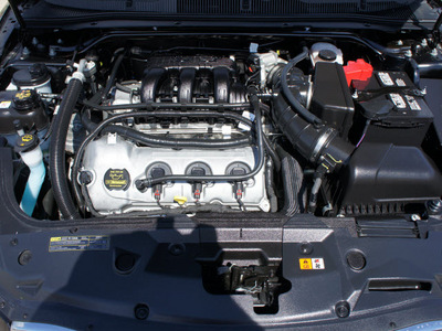 ford taurus 2011 black sedan sel gasoline 6 cylinders front wheel drive automatic 76108