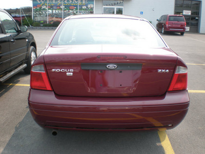 ford focus 2006 maroon sedan zx4 gasoline 4 cylinders front wheel drive automatic with overdrive 13502