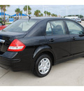 nissan versa 2011 black sedan 1 8 s gasoline 4 cylinders front wheel drive automatic with overdrive 77065