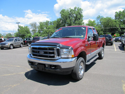 ford f 250 2003 red super duty gasoline 8 cylinders sohc 4 wheel drive automatic with overdrive 13502