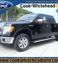 ford f 150 2011 black lariat gasoline 6 cylinders 4 wheel drive automatic 32401