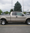 ford f 150 2006 tan gasoline 8 cylinders 4 wheel drive automatic with overdrive 13502