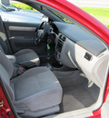 suzuki forenza 2006 red sedan s gasoline 4 cylinders front wheel drive automatic 13502